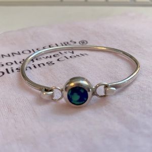 Sterling silver bracelet with blue / teal stone.